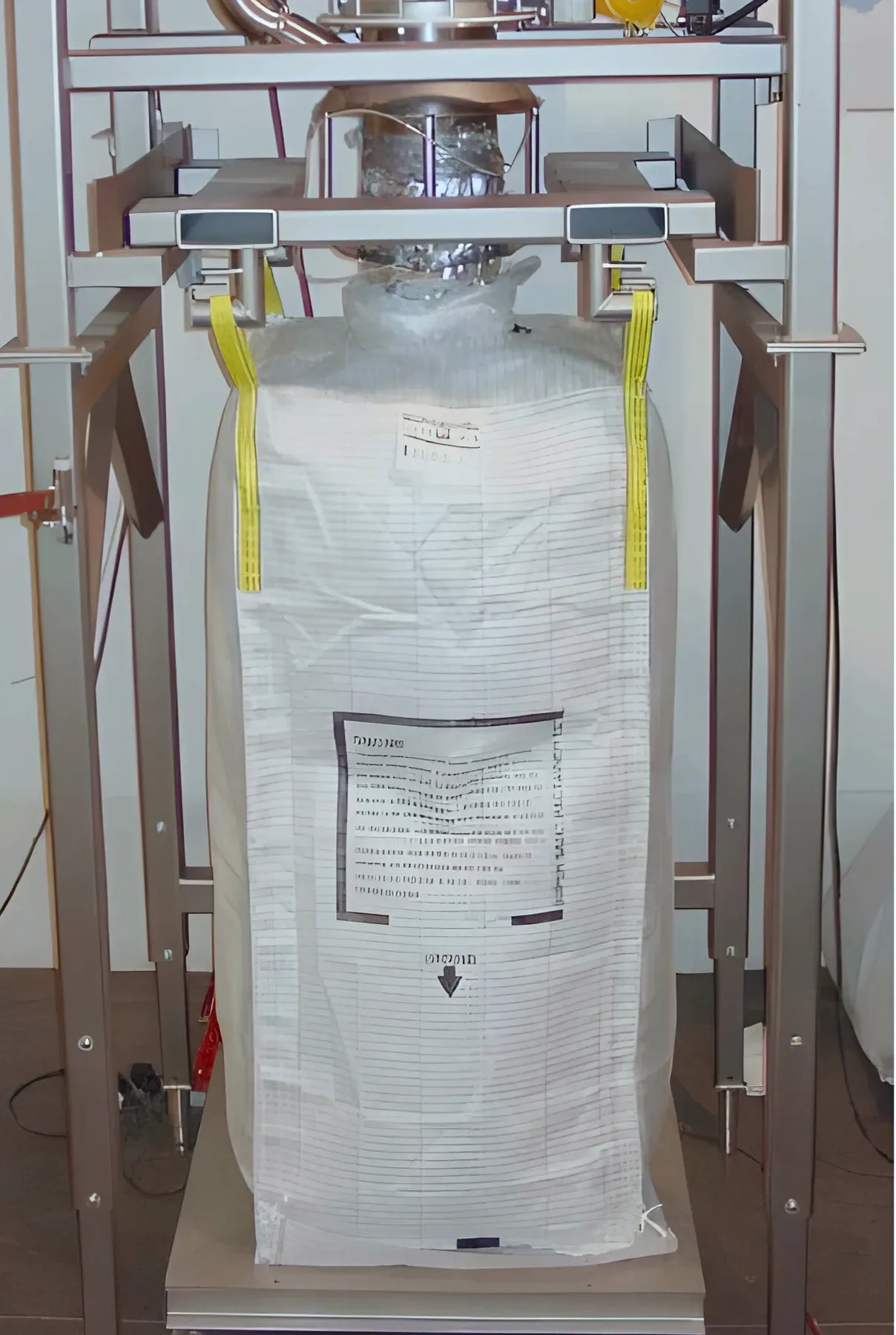Bulk bag part filled on a TLG filling head