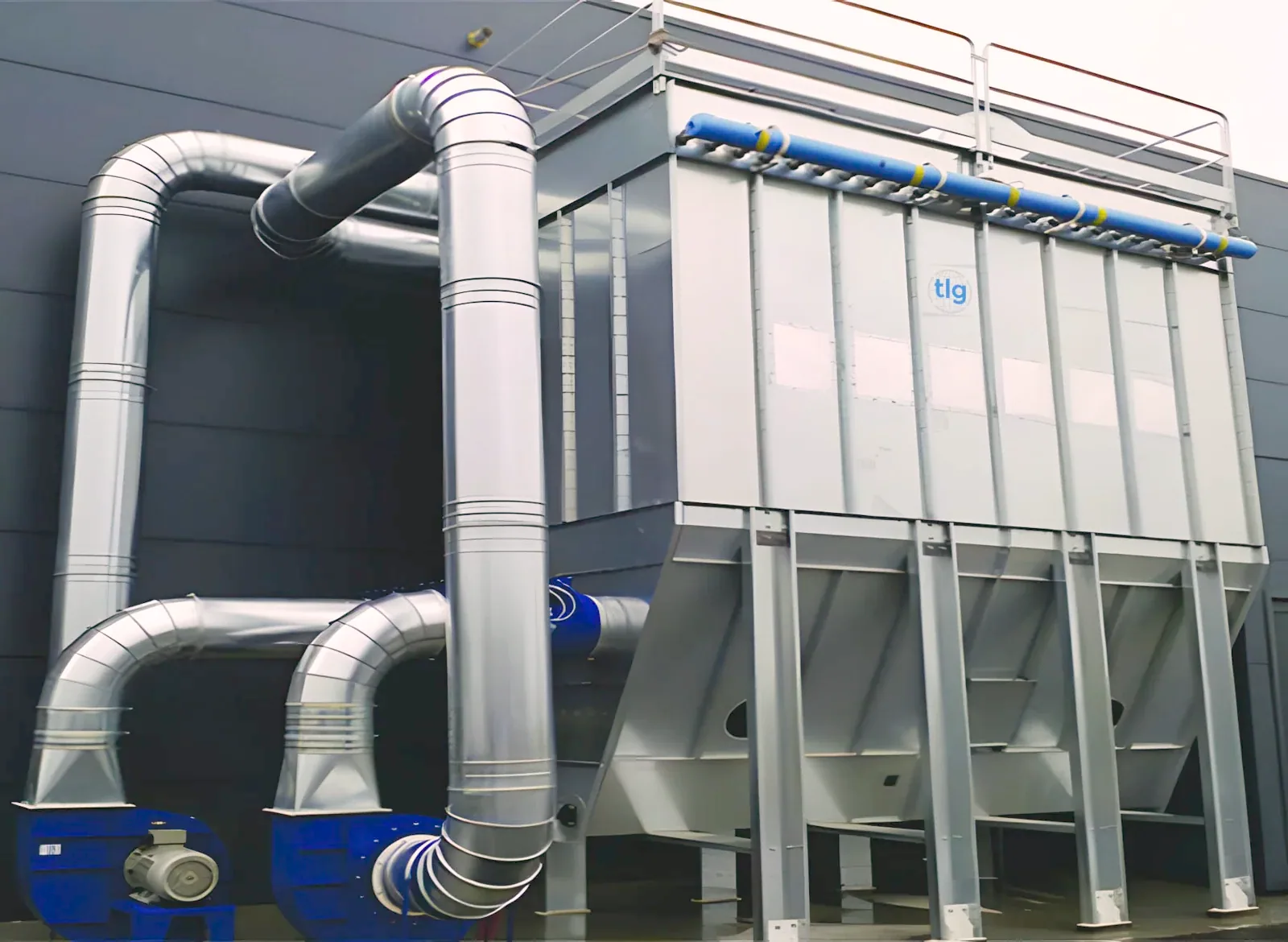 TLG reverse-jet dust collector with ducted pickups, installed