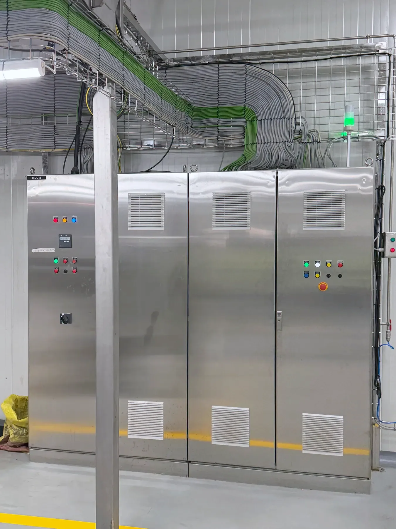 TLG stainless motor control panels installed with overhead cable trays